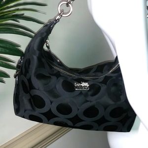 SOLD   Coach Madison Black logo op art signature shoulder bag.
